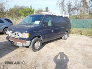 2002 Ford Econoline Cargo with VIN 1FTRE142X2HA67221, listed as a IAAI auction lot 42079493 with 180,324 mi miles. Bid and sale history available at carsss.com. Image 2.