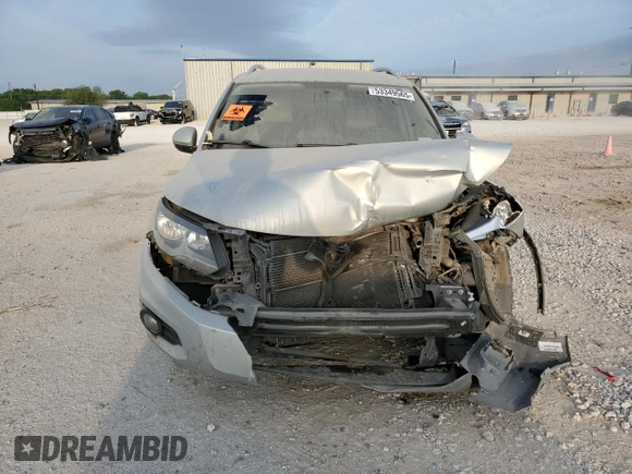 2012 Volkswagen Tiguan SEL with VIN WVGAV7AX2CW529098, listed as a Copart auction lot 53349565 with 128,603 mi miles and Salvage Title. Bid and sale history available at DreamBid. Image 5.