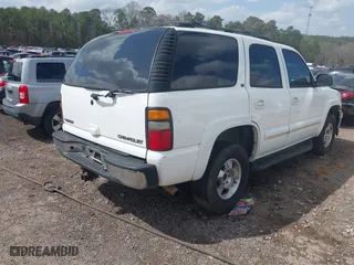 2004 Chevrolet Tahoe LT with VIN 1GNEC13Z44R192822, listed as a IAAI auction lot 41797924 with 211,818 mi miles. Bid and sale history available at carsss.com. Image 4.