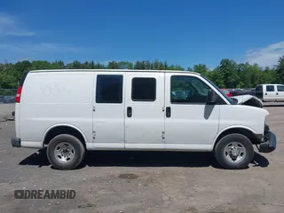 2014 Chevrolet Express Cargo Van with VIN 1GCWGFCA2E1210307, listed as a IAAI auction lot 39559260 with 213,814 mi miles. Bid and sale history available at carsss.com. Image 13.