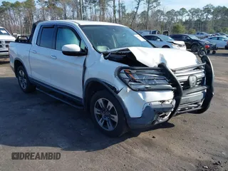 2018 Honda Ridgeline RTL-E with VIN 5FPYK3F71JB001753, listed as a IAAI auction lot 41510248 with 84,551 mi miles and . Bid and sale history available at DreamBid. Image 1.