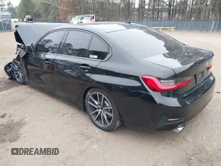 2019 BMW 3 Series 330i xDrive with VIN WBA5R7C52KAJ87697, listed as a IAAI auction lot 41795207 with 53,760 mi miles. Bid and sale history available at carsss.com. Image 3.