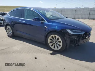 2017 Tesla Model X 90D with VIN 5YJXCDE23HF044790, listed as a Copart auction lot 52376565 with 105,712 mi miles and Salvage Title. Bid and sale history available at DreamBid. Image 4.