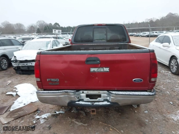 2000 Ford F-150 XL with VIN 1FTRX18L6YNA92785, listed as a IAAI auction lot 41618404 with 136,991 mi miles. Bid and sale history available at carsss.com. Image 16.