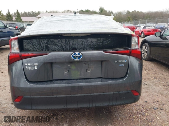 2021 Toyota Prius L Eco with VIN JTDKAMFU6M3140081, listed as a IAAI auction lot 42131187 with 103,973 mi miles and . Bid and sale history available at DreamBid. Image 16.