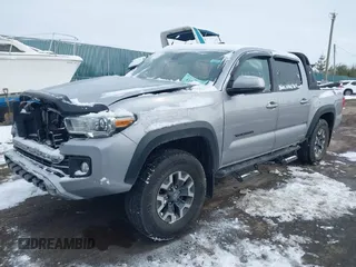 2019 Toyota Tacoma SR z VIN 3TMCZ5AN8KM211246, wystawiony jako IAAI lot #41574346 z przebiegiem 66 825 mil mil oraz . Historia ofert i sprzedaży dostępna na DreamBid. Obrazek 2.