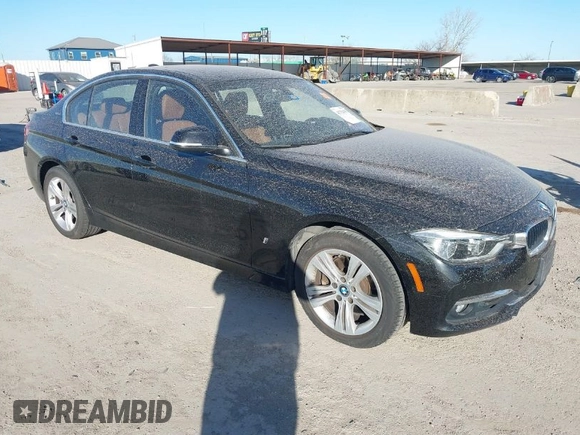 2017 BMW 3 Series 330e iPerformance with VIN WBA8E1C34HA156688, listed as a IAAI auction lot 41753490 with 74,130 mi miles. Bid and sale history available at carsss.com. Image 1.