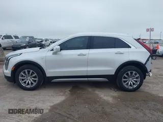 2023 Cadillac XT4 FWD Premium Luxury with VIN 1GYFZCR49PF225817, listed as a IAAI auction lot 42408494 with 5,977 mi miles and . Bid and sale history available at DreamBid. Image 14.