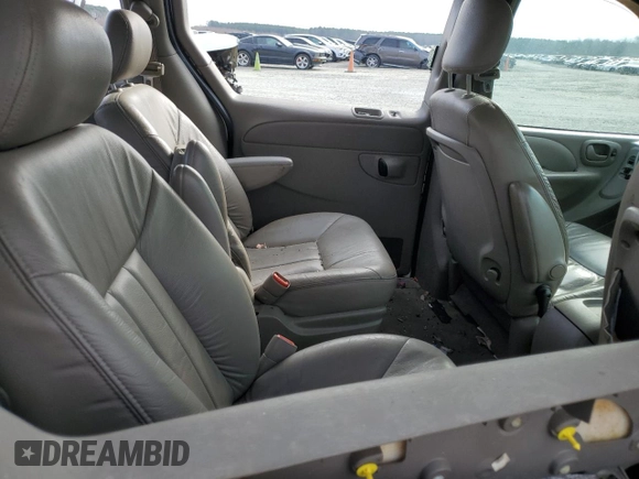 2001 Chrysler Town & Country LXi with VIN 2C8GP54L11R402563, listed as a Copart auction lot 86108164 with 179,021 mi miles and Salvage Title. Bid and sale history available at DreamBid. Image 11.