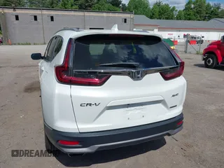 2022 Honda CR-V Touring with VIN 2HKRW2H91NH654021, listed as a IAAI auction lot 39517068 with 77,671 mi miles. Bid and sale history available at carsss.com. Image 16.