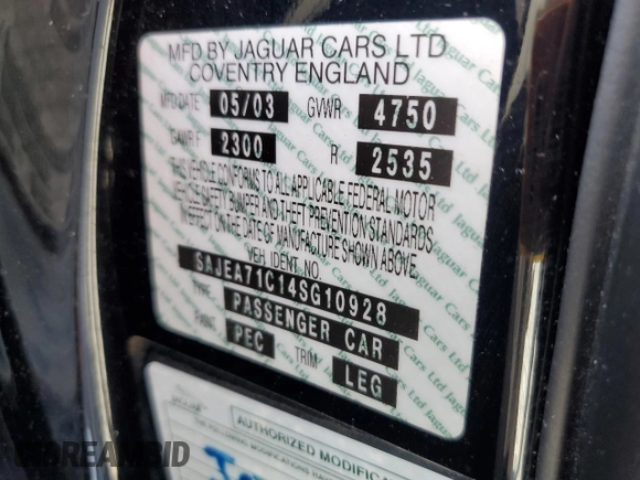 2004 Jaguar XJ with VIN SAJEA71C14SG10928, listed as a Copart auction lot 51202785 with 164,300 mi miles and Salvage Title. Bid and sale history available at carsss.com. Image 14.