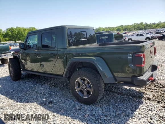 2022 Jeep Gladiator Rubicon с VIN 1C6JJTBGXNL130958, выставлен на аукционе Copart как лот 52515165 с пробегом 62 152 миль миль и Списание • Salvage title. История ставок и продаж доступна на DreamBid. Изображение 2.