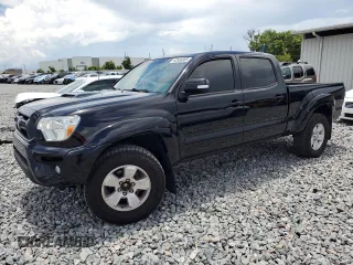 2014 Toyota Tacoma PreRunner with VIN 3TMKU4HN0EM039955, listed as a Copart auction lot 63556905 with 163,066 mi miles and Salvage title. Bid and sale history available at DreamBid. Image 1.