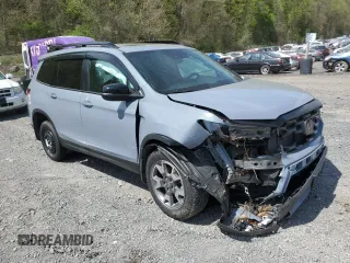 2023 Honda Passport TrailSport with VIN 5FNYF8H65PB040191, listed as a Copart auction lot 54735295 with Not provided miles and Salvage title. Bid and sale history available at DreamBid. Image 4.