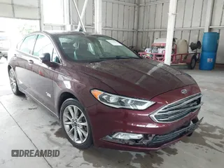 2017 Ford Fusion Titanium z VIN 3FA6P0SU1HR256249, wystawiony jako IAAI lot #42363826 z przebiegiem 102 687 mil mil oraz . Historia ofert i sprzedaży dostępna na DreamBid. Obrazek 1.
