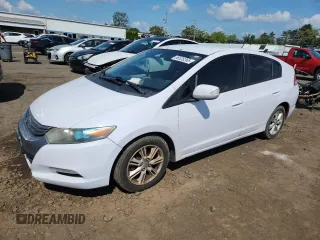 2010 Honda Insight EX with VIN JHMZE2H75AS024918, listed as a Copart auction lot 66526265 with 312,605 mi miles and Salvage title. Bid and sale history available at DreamBid. Image 1.