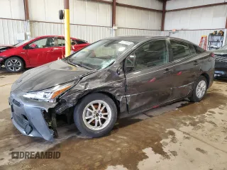 2021 Toyota Prius L Eco z VIN JTDKAMFU3M3149885, wystawiony jako Copart lot #52718945 z przebiegiem 66 475 mil mil oraz Szkoda całkowita • Salvage title. Historia ofert i sprzedaży dostępna na DreamBid. Obrazek 1.