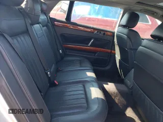 2004 Volkswagen Phaeton V8 z VIN WVWAF63D348008461, wystawiony jako Copart lot #75664804 z przebiegiem 207 769 mil mil oraz Szkody całkowita. Historia ofert i sprzedaży dostępna na DreamBid. Obrazek 10.