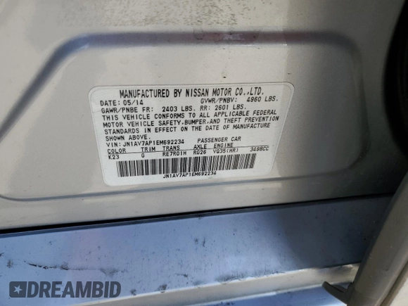 2014 Infiniti Q50 Hybrid Premium with VIN JN1AV7AP1EM692234, listed as a Copart auction lot 48697525 with 104,586 mi miles and Salvage Title. Bid and sale history available at DreamBid. Image 14.