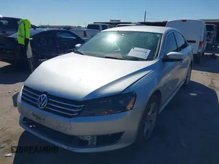 2013 Volkswagen Passat SE w/Sunroof with VIN 1VWBH7A34DC003147, listed as a IAAI auction lot 41662970 with 153,897 mi miles. Bid and sale history available at carsss.com. Image 2.
