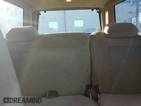 1997 Ford Explorer XL with VIN 1FMDU34E5VZB40878, listed as a Copart auction lot 84009744 with 185,047 mi miles and Salvage title. Bid and sale history available at DreamBid. Image 10.
