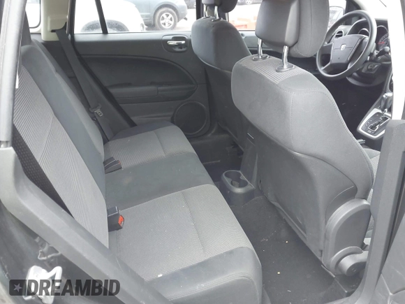 2011 Dodge Caliber Heat with VIN 1B3CB5HA7BD110672, listed as a IAAI auction lot 41709487 with 59,679 mi miles and . Bid and sale history available at DreamBid. Image 8.