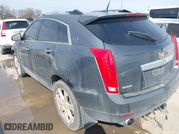 2013 Cadillac SRX Performance Collection with VIN 3GYFNDE38DS598028, listed as a IAAI auction lot 41452362 with 201,261 mi miles and . Bid and sale history available at DreamBid. Image 3.