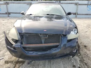 2004 Nissan Altima SE z VIN 1N4BL11E24C153716, wystawiony jako Copart lot #54332265 z przebiegiem 203 330 mil mil oraz Szkoda całkowita • Salvage title. Historia ofert i sprzedaży dostępna na DreamBid. Obrazek 5.