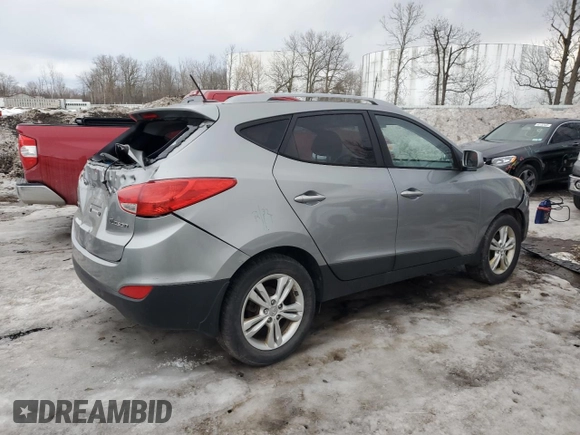 2010 Hyundai Tucson GLS with VIN KM8JU3AC2AU113747, listed as a Copart auction lot 48031375 with 220,982 mi miles and Salvage Title. Bid and sale history available at DreamBid. Image 3.