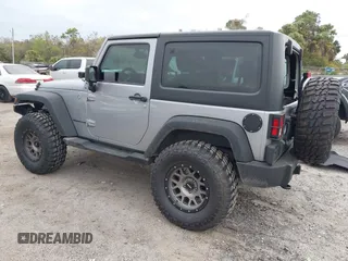2014 Jeep Wrangler Sport with VIN 1C4AJWAG0EL265409, listed as a IAAI auction lot 41726935 with 78,547 mi miles and . Bid and sale history available at DreamBid. Image 3.