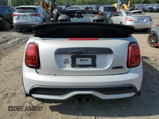 2022 MINI Convertible Cooper S z VIN WMW43DL08N3N99681, wystawiony jako Copart lot #67152054 z przebiegiem Nie podano mil oraz Szkoda całkowita • Salvage title. Historia ofert i sprzedaży dostępna na DreamBid. Obrazek 6.