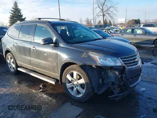 2016 Chevrolet Traverse LT z VIN 1GNKRGKD9GJ301823, wystawiony jako IAAI lot #41374254 z przebiegiem 145 235 mil mil oraz . Historia ofert i sprzedaży dostępna na DreamBid. Obrazek 1.