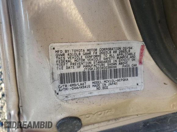 1994 Toyota Camry XLE with VIN JT2GK13E0R0038694, listed as a Copart auction lot 87843865 with 175,134 mi miles and Salvage Title. Bid and sale history available at carsss.com. Image 14.