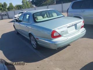 2004 Jaguar XJ 8 with VIN SAJEA71CX4SG10751, listed as a IAAI auction lot 42149348 with 89,786 mi miles and . Bid and sale history available at DreamBid. Image 3.