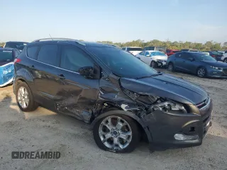 2016 Ford Escape Titanium with VIN 1FMCU9J91GUA47829, listed as a Copart auction lot 54051275 with 86,046 mi miles and Salvage Title. Bid and sale history available at DreamBid. Image 4.