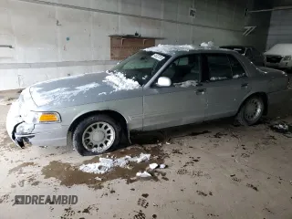 2002 Ford Crown Victoria LX z VIN 2FAFP74W32X113397, wystawiony jako Copart lot #45327015 z przebiegiem 158 062 mil mil oraz Tytuł czysty. Historia ofert i sprzedaży dostępna na DreamBid. Obrazek 1.