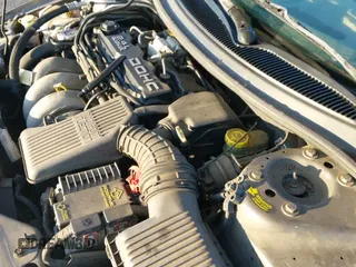 2000 Dodge Stratus SE with VIN 1B3EJ46X5YN133643, listed as a IAAI auction lot 41863523 with 181,283 mi miles and . Bid and sale history available at DreamBid. Image 12.