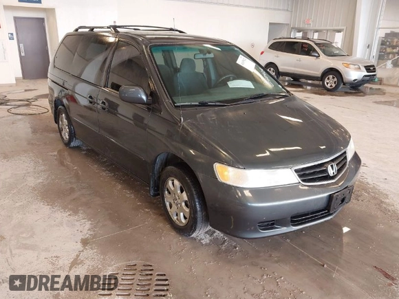 2004 Honda Odyssey EX z VIN 5FNRL18674B050429, wystawiony jako IAAI lot #41655622 z przebiegiem 257 656 mil mil oraz . Historia ofert i sprzedaży dostępna na DreamBid. Obrazek 1.