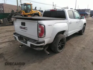 2022 GMC Canyon 4WD Elevation z VIN 1GTG6CEN8N1169512, wystawiony jako IAAI lot #42015869 z przebiegiem 60 159 mil mil oraz . Historia ofert i sprzedaży dostępna na DreamBid. Obrazek 4.