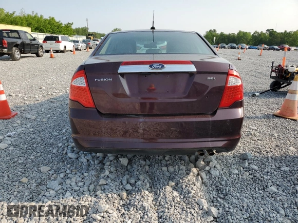 2012 Ford Fusion SEL z VIN 3FAHP0JA4CR410011, wystawiony jako Copart lot #57872835 z przebiegiem 187 756 mil mil oraz Szkoda całkowita • Salvage title. Historia ofert i sprzedaży dostępna na DreamBid. Obrazek 6.