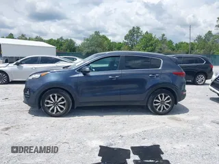 2019 Kia Sportage EX with VIN KNDPN3AC2K7577536, listed as a IAAI auction lot 42149104 with 66,197 mi miles and . Bid and sale history available at DreamBid. Image 14.