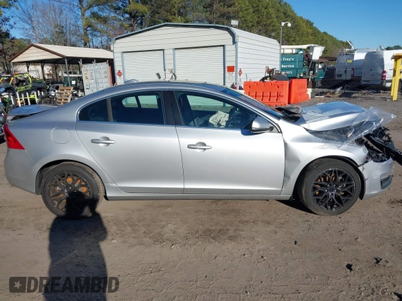 2016 Volvo S60 T5 Drive-E Premier z VIN YV126MFKXG1395519, wystawiony jako IAAI lot #41488969 z przebiegiem 109 130 mil mil oraz . Historia ofert i sprzedaży dostępna na DreamBid. Obrazek 12.