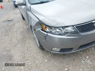 2010 Kia Forte SX with VIN KNAFW4A31A5048066, listed as a IAAI auction lot 42102810 with 160,998 mi miles. Bid and sale history available at carsss.com. Image 6.