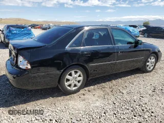 2000 Toyota Avalon XL with VIN 4T1BF28B1YU051192, listed as a Copart auction lot 57316755 with 275,671 mi miles and Salvage title. Bid and sale history available at DreamBid. Image 3.