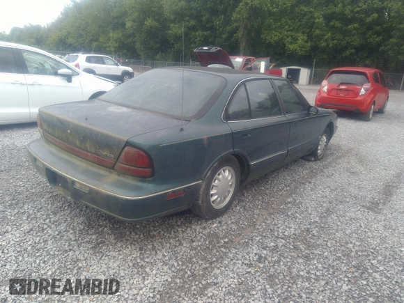 1998 Oldsmobile 88 LS z VIN 1G3HN52K5W4849011, wystawiony jako IAAI lot #42153650 z przebiegiem 171 969 mil mil oraz . Historia ofert i sprzedaży dostępna na DreamBid. Obrazek 4.