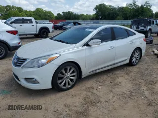 2013 Hyundai Azera z VIN KMHFH4JG4DA214345, wystawiony jako Copart lot #57491015 z przebiegiem 178 722 mil mil oraz Czysty tytuł • Clean title. Historia ofert i sprzedaży dostępna na DreamBid. Obrazek 1.