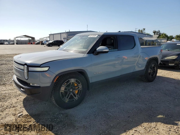 2022 Rivian R1T Adventure z VIN 7FCTGAAA0NN010103, wystawiony jako Copart lot #53312035 z przebiegiem 48 333 mil mil oraz Szkody całkowita. Historia ofert i sprzedaży dostępna na DreamBid. Obrazek 1.