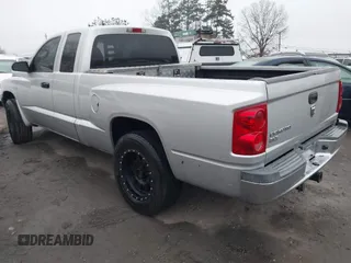 2005 Dodge Dakota SLT с VIN 1D7HE42K25S309240, выставлен на аукционе IAAI как лот 41553779 с пробегом 203 769 миль миль и . История ставок и продаж доступна на DreamBid. Изображение 3.