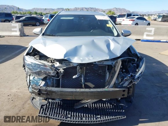 2017 Toyota Corolla L with VIN 2T1BURHE8HC939058, listed as a IAAI auction lot 42530114 with 68,636 mi miles and . Bid and sale history available at DreamBid. Image 13.