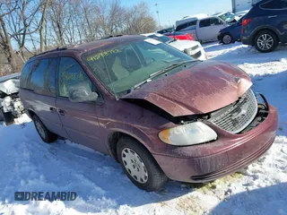 2002 Chrysler Town & Country LX with VIN 2C4GP44382R661452, listed as a IAAI auction lot 41288788 with 216,457 mi miles. Bid and sale history available at carsss.com. Image 1.